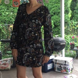 Long sleeve shift dress.